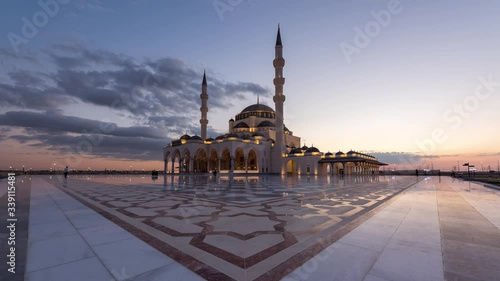 4K Day to Night Transition Timelapse of Sharjah Mosque, UAE.