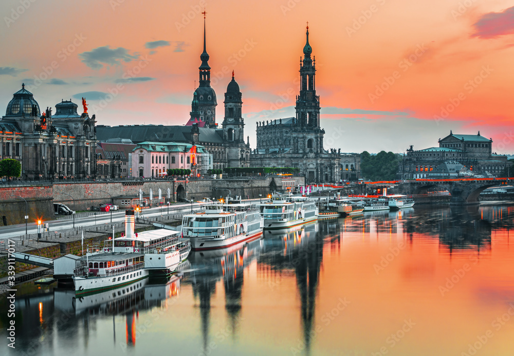 Fototapeta premium Dresden city skyline at Elbe river and Augustus bridge at sunset, Dresden, Saxony, Germany