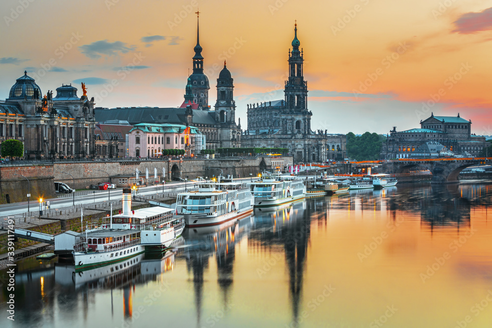 Dresden city skyline at Elbe river and Augustus bridge at sunset, Dresden, Saxony, Germany