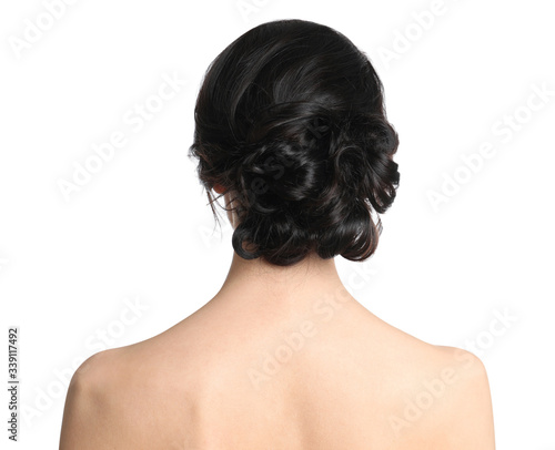 Young woman with beautiful hair on white background, back view
