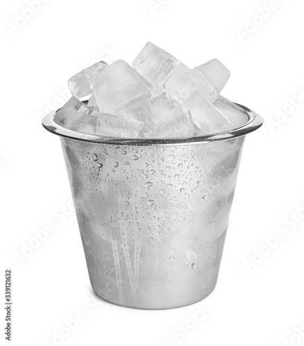 Metal bucket with ice cubes isolated on white