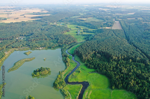 Fototapeta Naklejka Na Ścianę i Meble -  Drone shot of lake and river in Mazury/Poland.