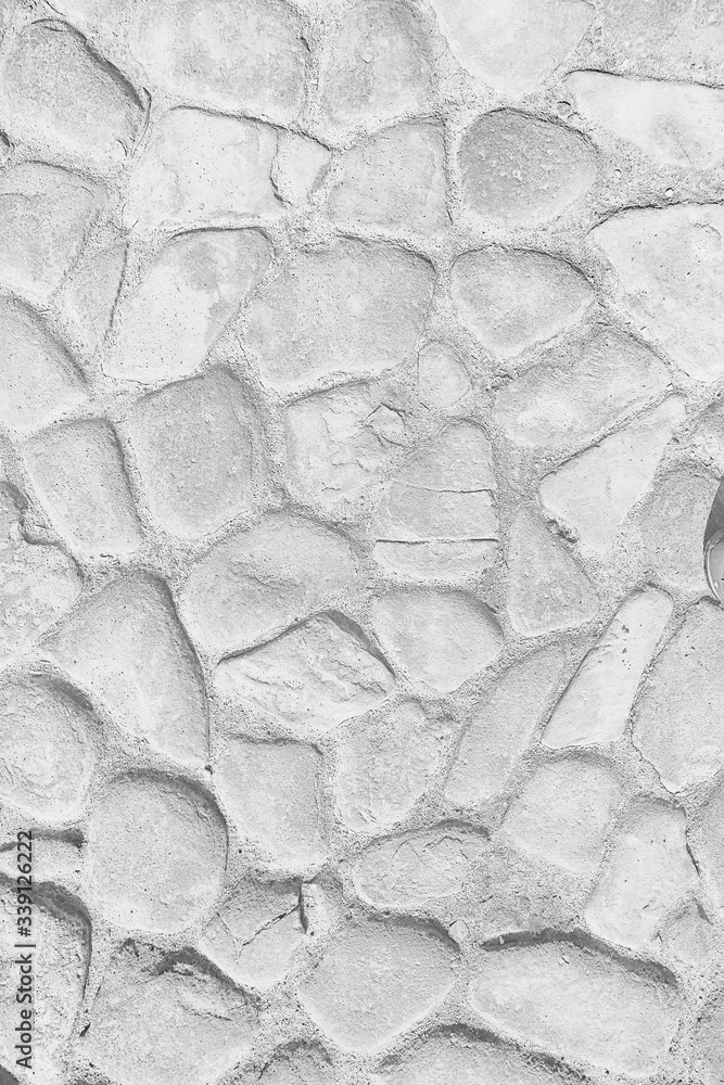Fototapeta old stone pavement background / abstract pavement, large cobblestones, old road texture