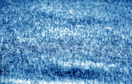 Sack cloth texture with blur effect in navy blue color.