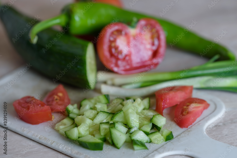 sliced cucumber, tomato, pepper and green onion. sliced cucumber, tomato, pepper and green onion.