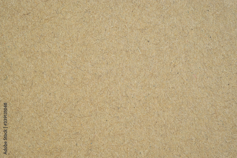 Texture of brown craft paper or kraft paper background. Stock