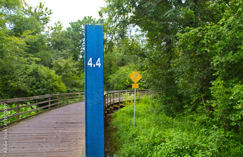 Four Point Four Marker Before Bridge on a Rural Runnint Trail