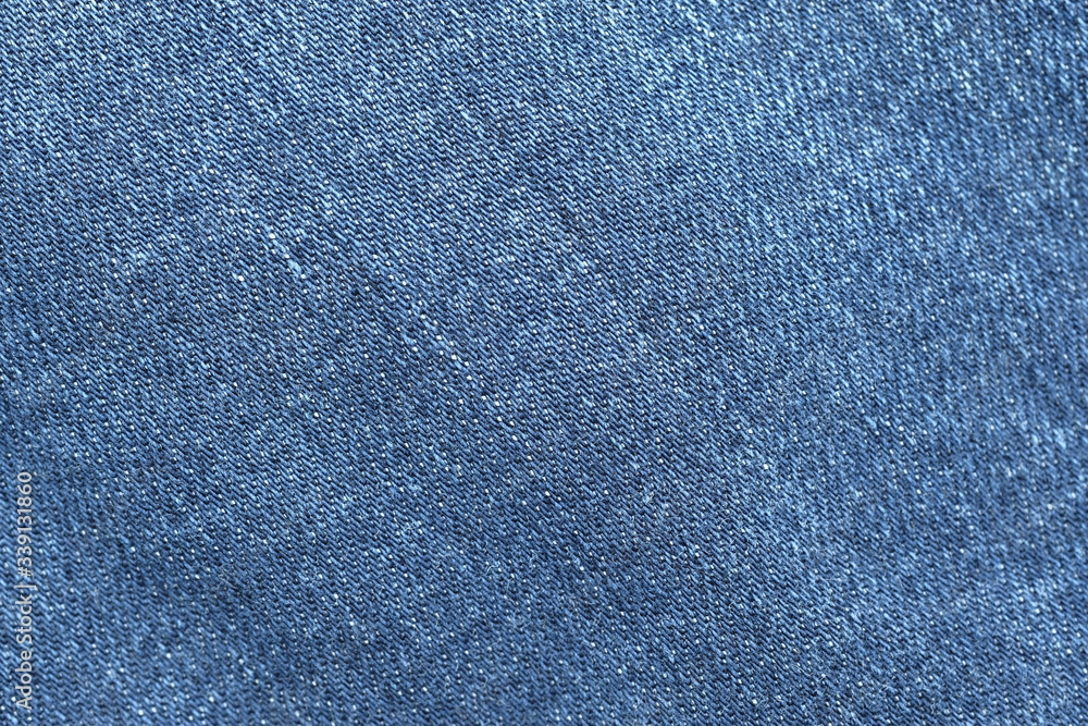 Abstract fabric texture of blue jeans or denim background. Abstract fabric texture of blue jeans or denim background.