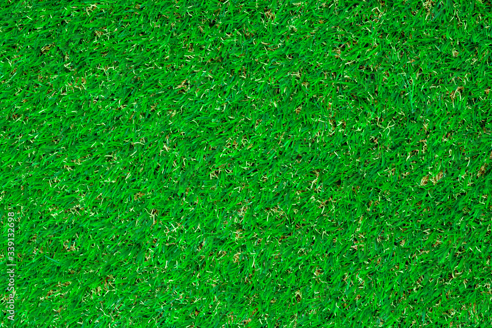 Top view of artificial green grass texture. Top view of artificial green grass texture.