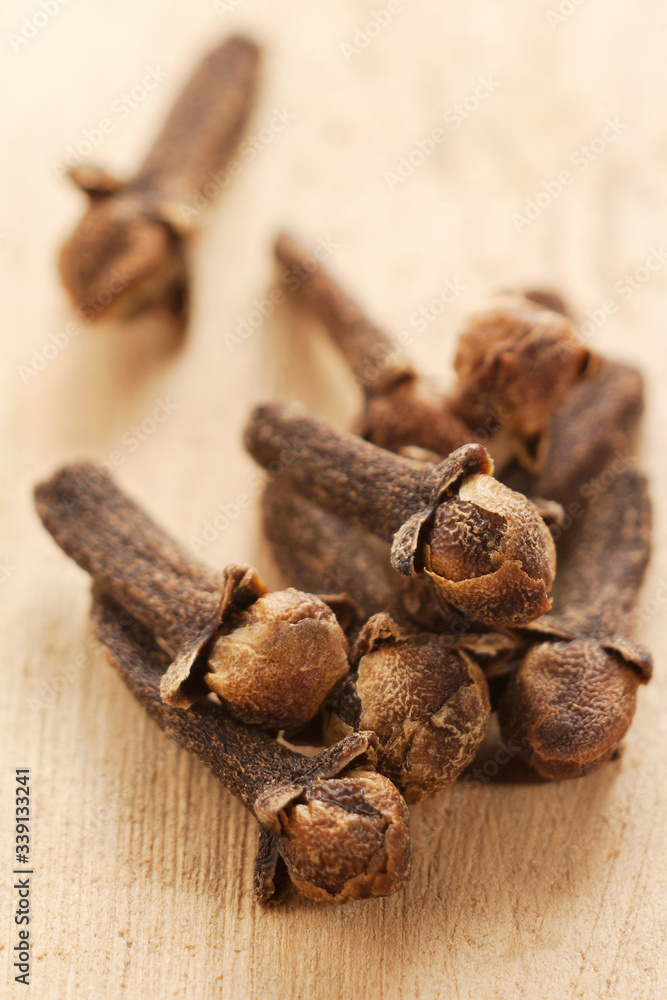 Obraz premium spice clove on a wooden background