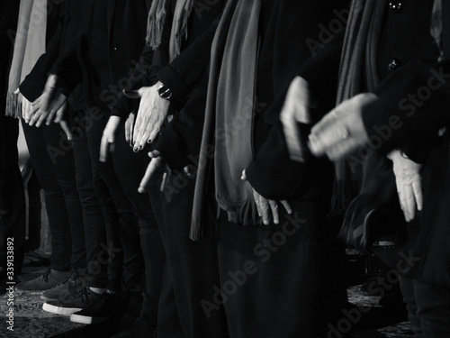 women from the chorus singing