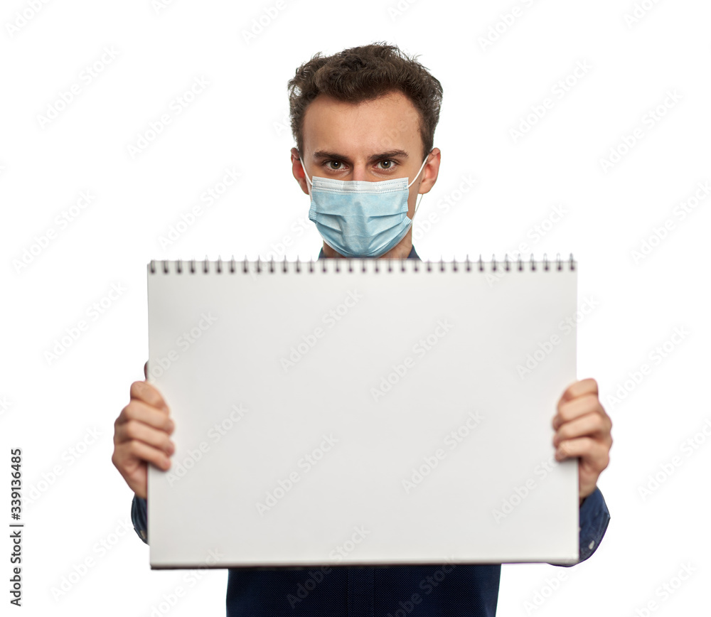 Young man with mask and whiteboard Young man with mask and whiteboard