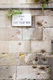 Sant Felip Neri Square, with shrapnel impacts on the walls, Barcelona, Spain.