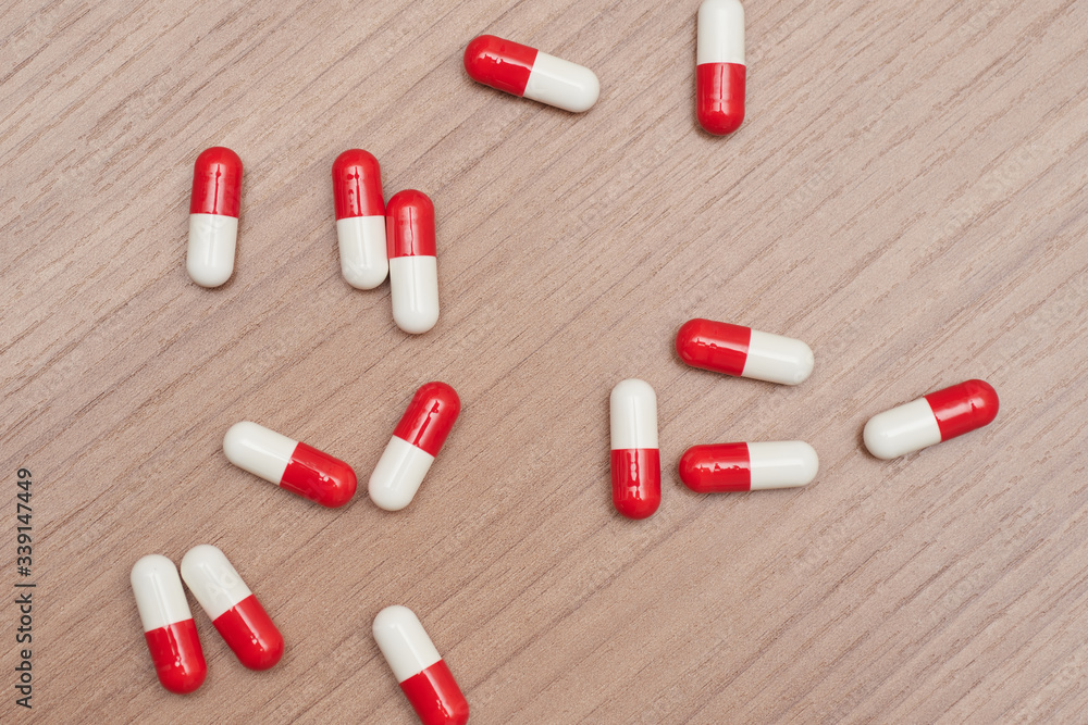 lots of red and white capsules, pills lots of red and white capsules, pills