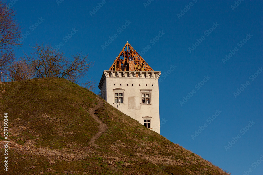 Sights and views of Grodno. Belarus. Restoration of an old castle located on a high hill.