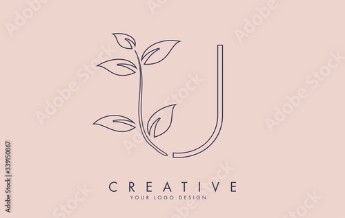 Outline Leaf Letter U Logo Design with Leaves on a Branch and Pink Background. Letter U with nature concept.