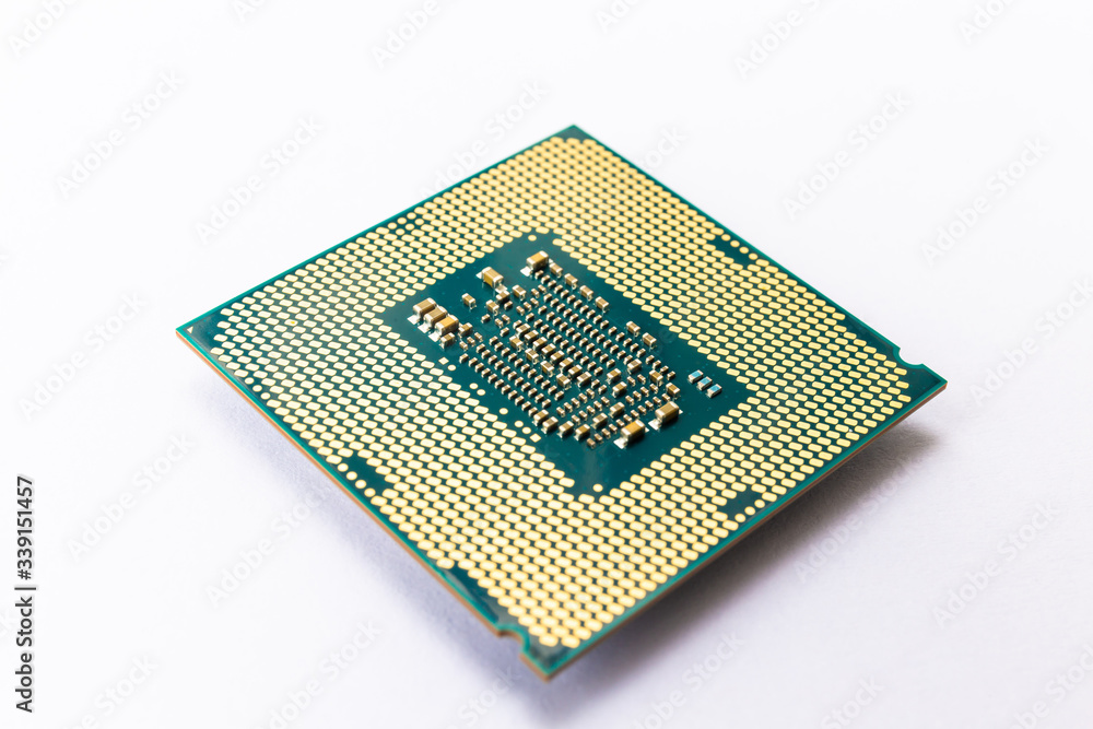 Modern CPU processor chip isolated on white background. Select focus Modern CPU processor chip isolated on white background. Select focus