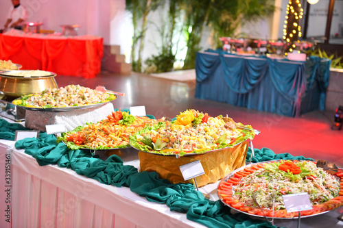 A traditional Indian wedding buffet. Assortment of traditional cuisine at an Asian wedding.