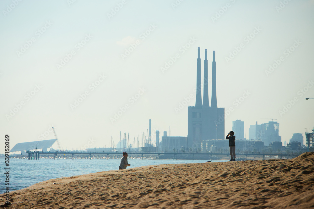 Barceloneta beach at sunrise in Barcelona, Spain