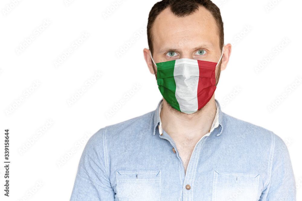 portrait of a young man in a medical mask with the flag of italy on a white background, isolate, copy space portrait of a young man in a medical mask with the flag of italy on a white background, isolate, copy space
