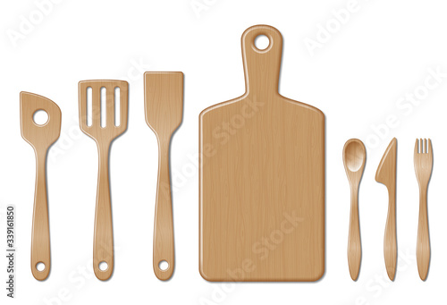 Bamboo kitchen utensils set isolated on white. Kitchenware set with spoon, fork dinner knife and flat plate, platter. Wooden kitchenware utensils. Kitchenware utensils