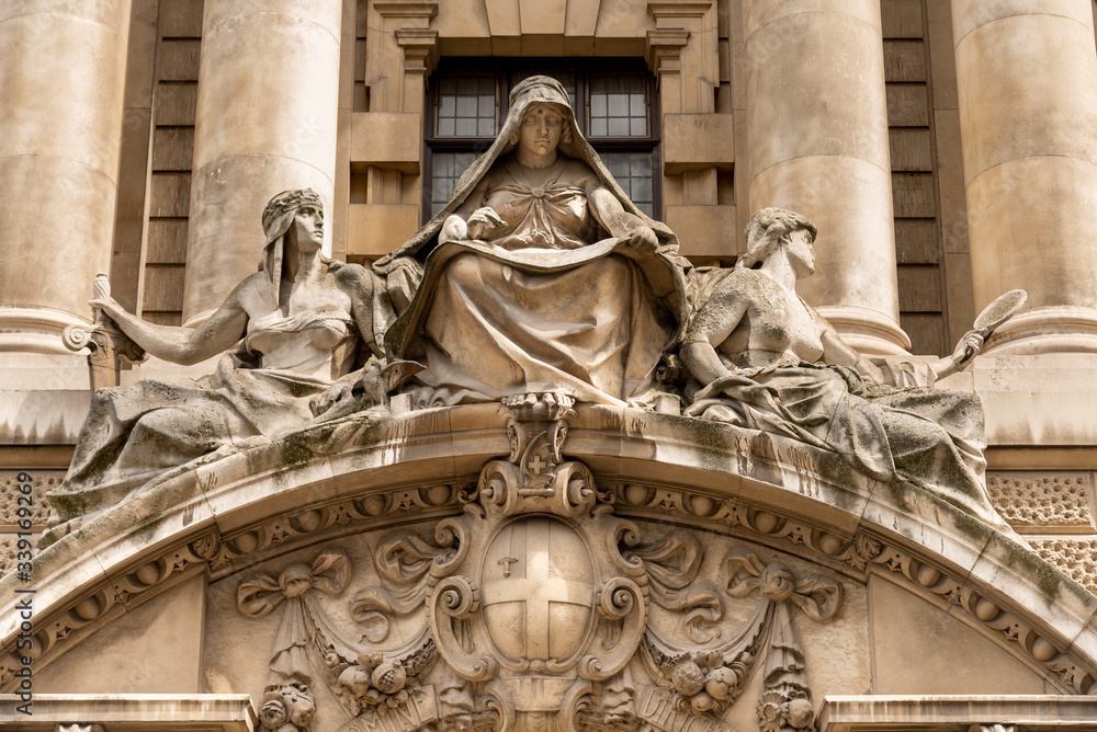 Fortitude and Truth by Frederick William Pomeroy over the main door of the Old Bailey, London, UK