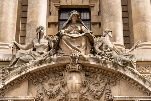Fortitude and Truth by Frederick William Pomeroy over the main door of the Old Bailey, London, UK photo