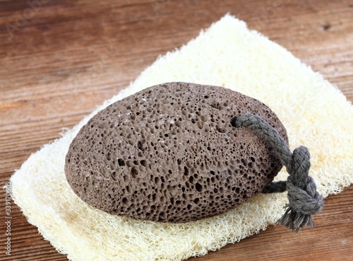 Картината върху платно Volcanic pumice stone on the  washcloth  in rustic style
