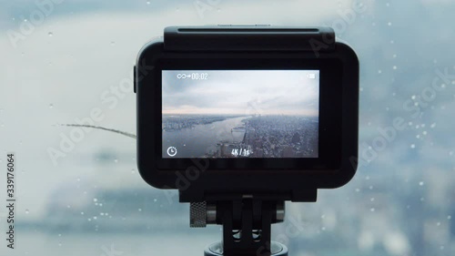 View from an action cam in the One World observatory of the New York City skyline at sunset photo