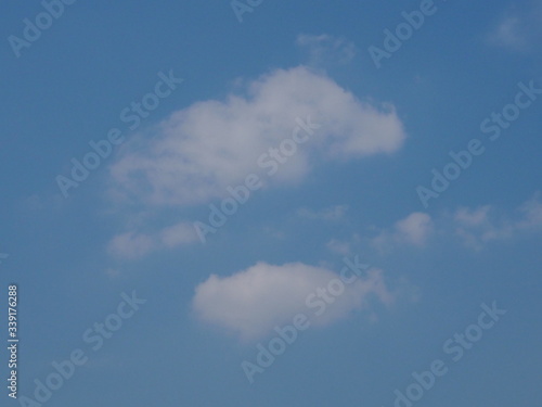 white clouds in the blue sky natural background beautiful nature environment space for write © pakn