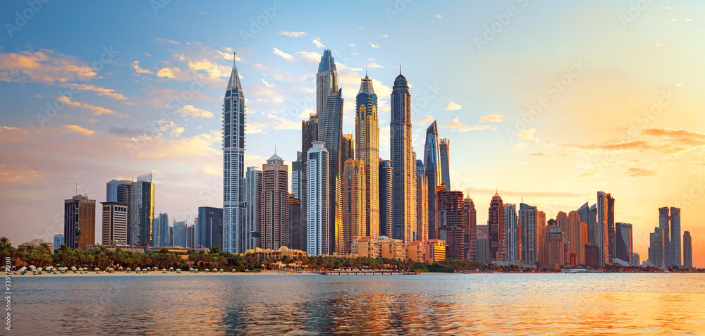 Dubai Marina, city of tourism from Palm Island at sunrise, United Arab Emirates