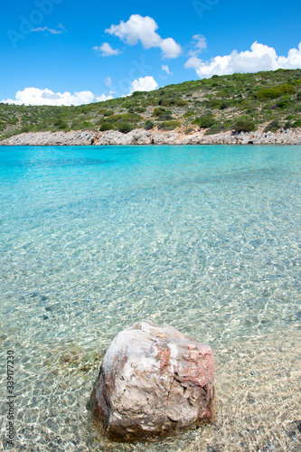 Crystal clear, Caribbean-like waters of Agia Dynami beach on Chios island, Greece.