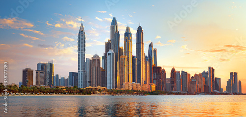 Dubai Marina, city of tourism from Palm Island at sunrise, United Arab Emirates