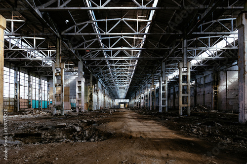Abandoned large industrial hall waiting for demolition. Former Voronezh excavator manufacturing factory