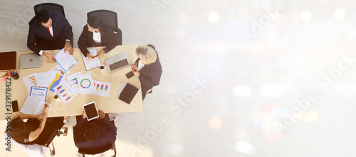 Banner picture of top view of executive professional business people team meeting with copy space