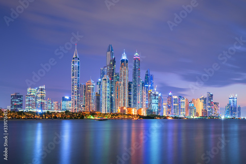 Dubai Marina  city of tourism from Palm Island at sunrise  United Arab Emirates