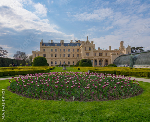 View of Lednice castle with beautiful park and garden in spring, Neo-gothic palace in South Moravia,Czech Republic