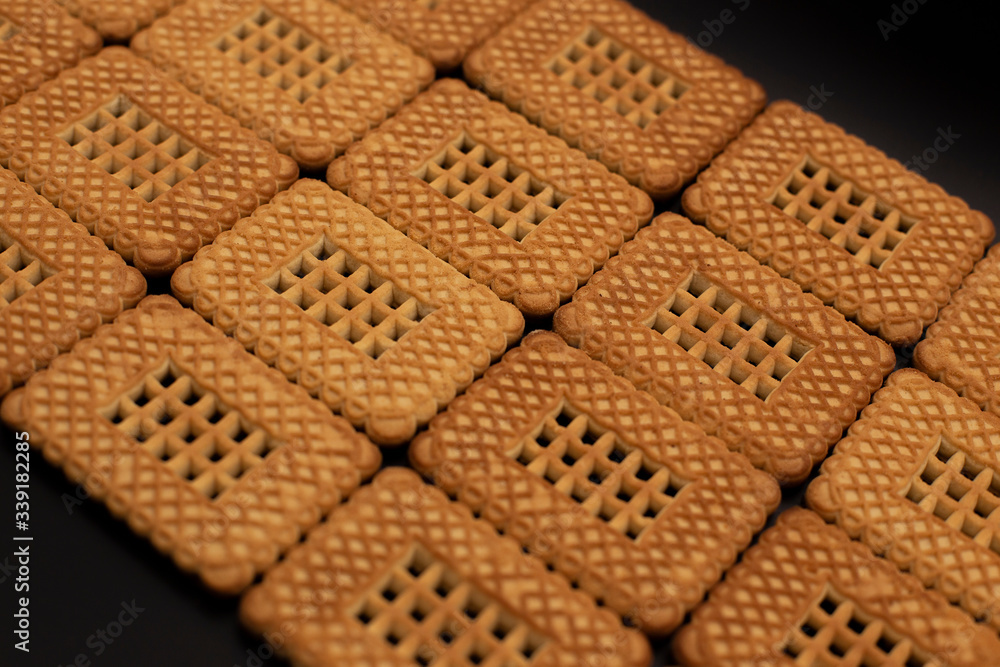 Cookies are spread out on a dark background Cookies are spread out on a dark background
