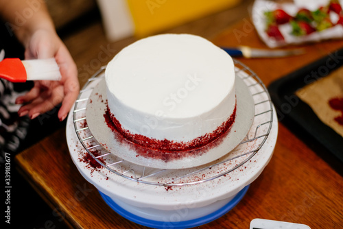 Red velvet cake. The process of making a cake is red velvet.