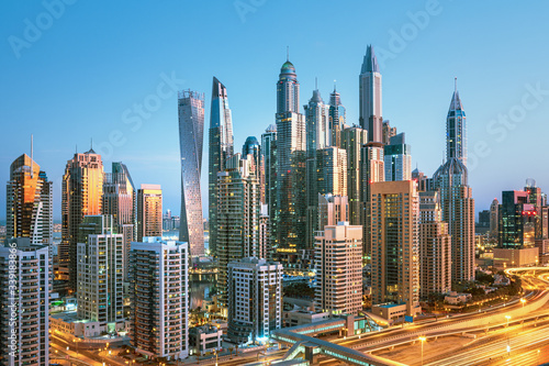Amazing and Luxury Dubai Marina skyscrapers  famous Jumeirah beach skyscrapers at sunrise  United Arab Emirates