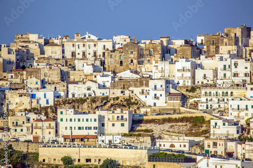 Beautiful view of the Bay of Peschici with village perched on the rock and its beach