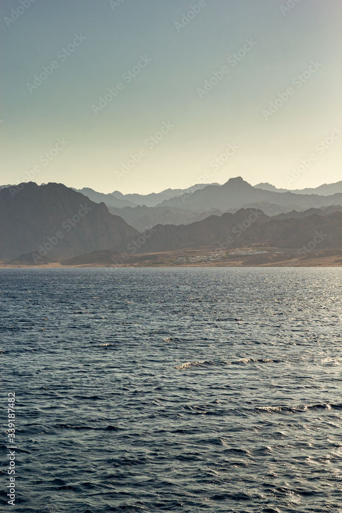 Egyptian mountains view from the red sea. landscape of mountains at sunset