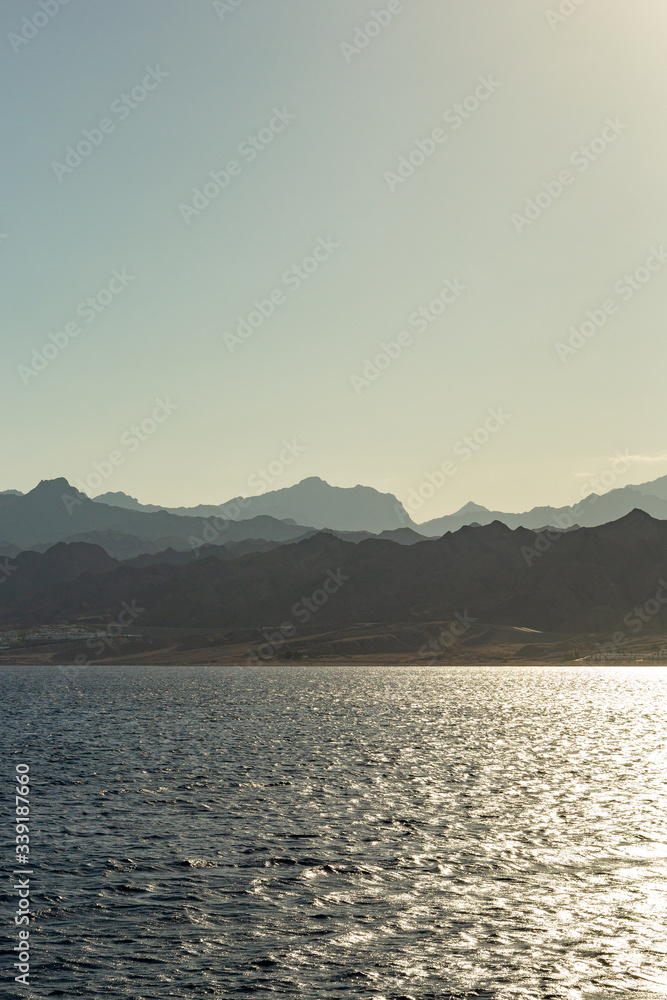 Egyptian mountains view from the red sea. landscape of mountains at sunset