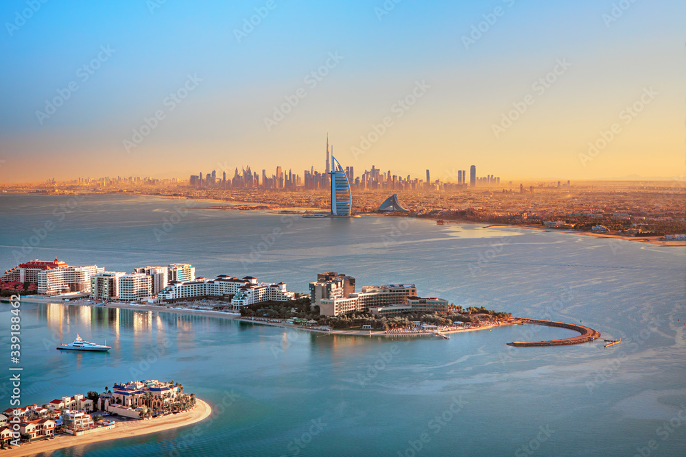 Dubai - aerial view skyline of Dubai city and famous Jumeirah beach, United Arab Emirates