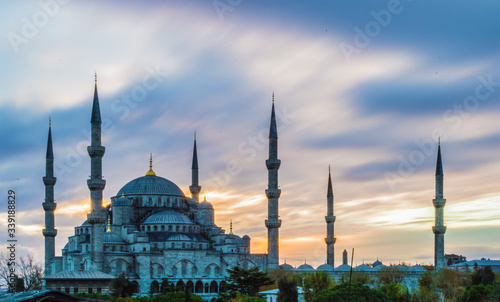 Long exposure photo of Blue Mosque at dusk in Istanbul, Turkey  with vibrant colored sky. © HaniSantosa