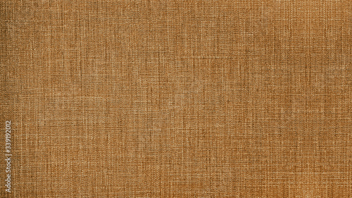 Caramel brown natural cotton linen textile texture background