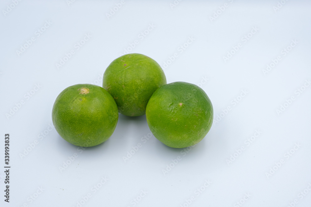 green lemon isolated from white background green lemon isolated from white background