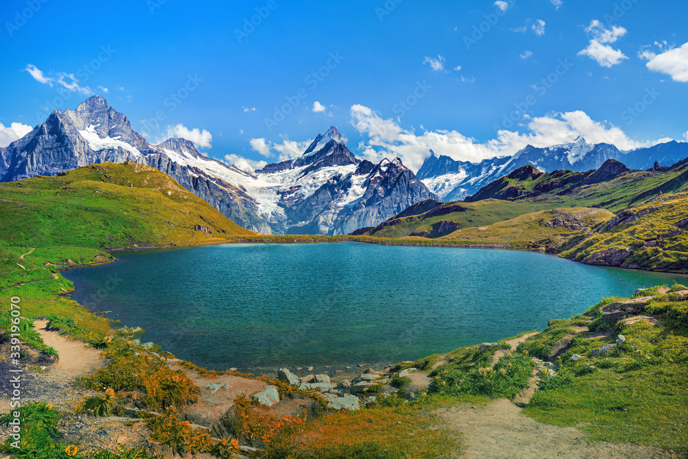 Fototapeta premium Bernese range above Bachalpsee lake. Peaks Eiger, Jungfrau, Faulhorn in famous location in Switzerland alps, Grindelwald valley