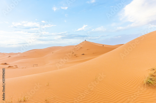 Beautiful landscape of the dunes of the Sahara Desert at dusk, Merzouga, morocco