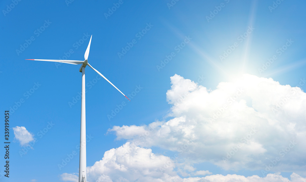 Power generation wind turbines against the blue sky with clouds. Power generation wind turbines against the blue sky with clouds.